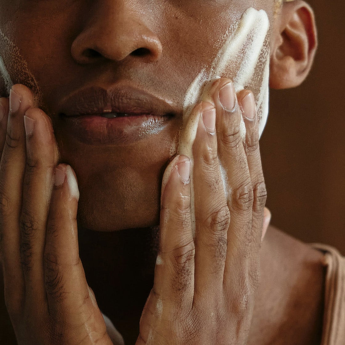 Man applies peeling to face